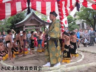 釣上地区の土俵入りの写真