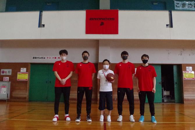 選手と区長